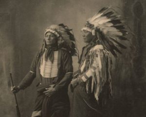 Photo of 2 indigenous men in traditional clothing